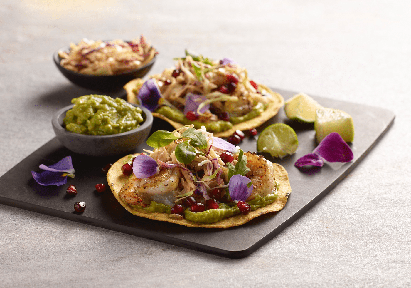 Adobo de Guajillo Shrimp Tostadas on a platter