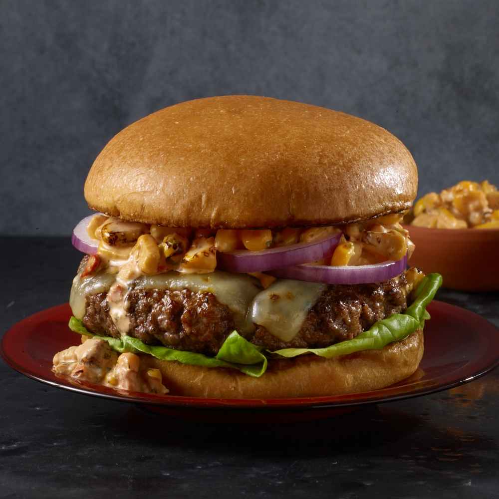 Mexican street corn burger on a plate